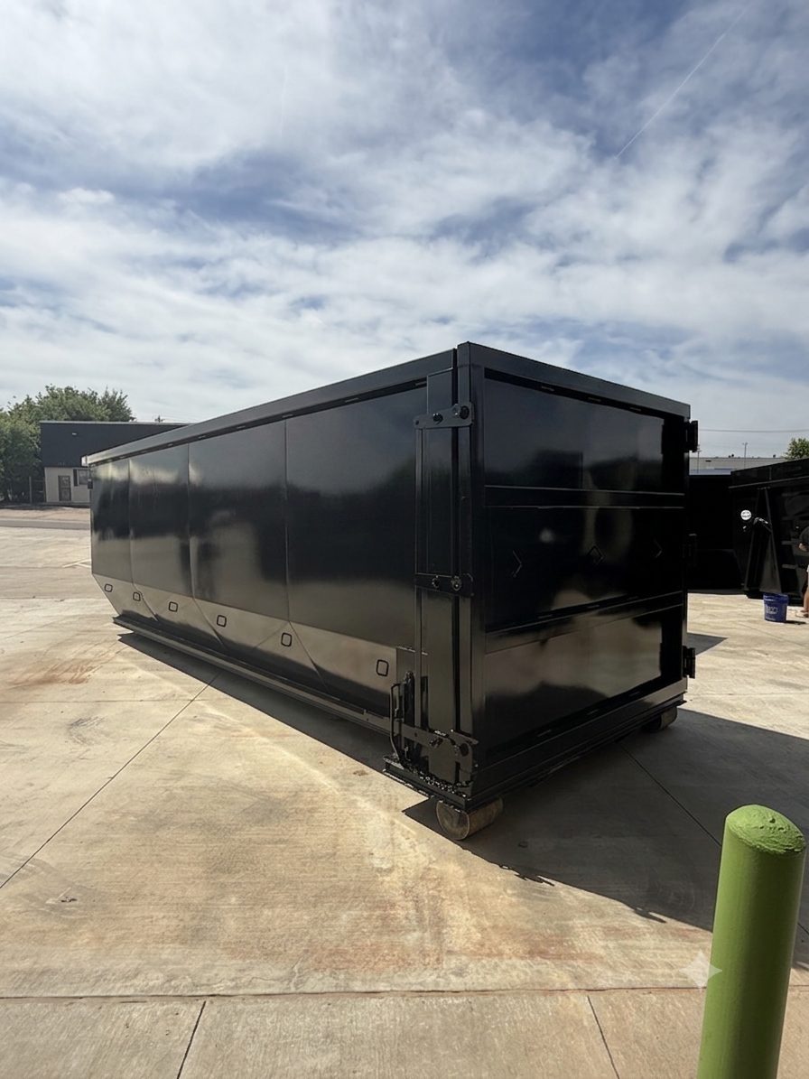 Black roll-off dumpster ready for delivery in Chickasha, OK